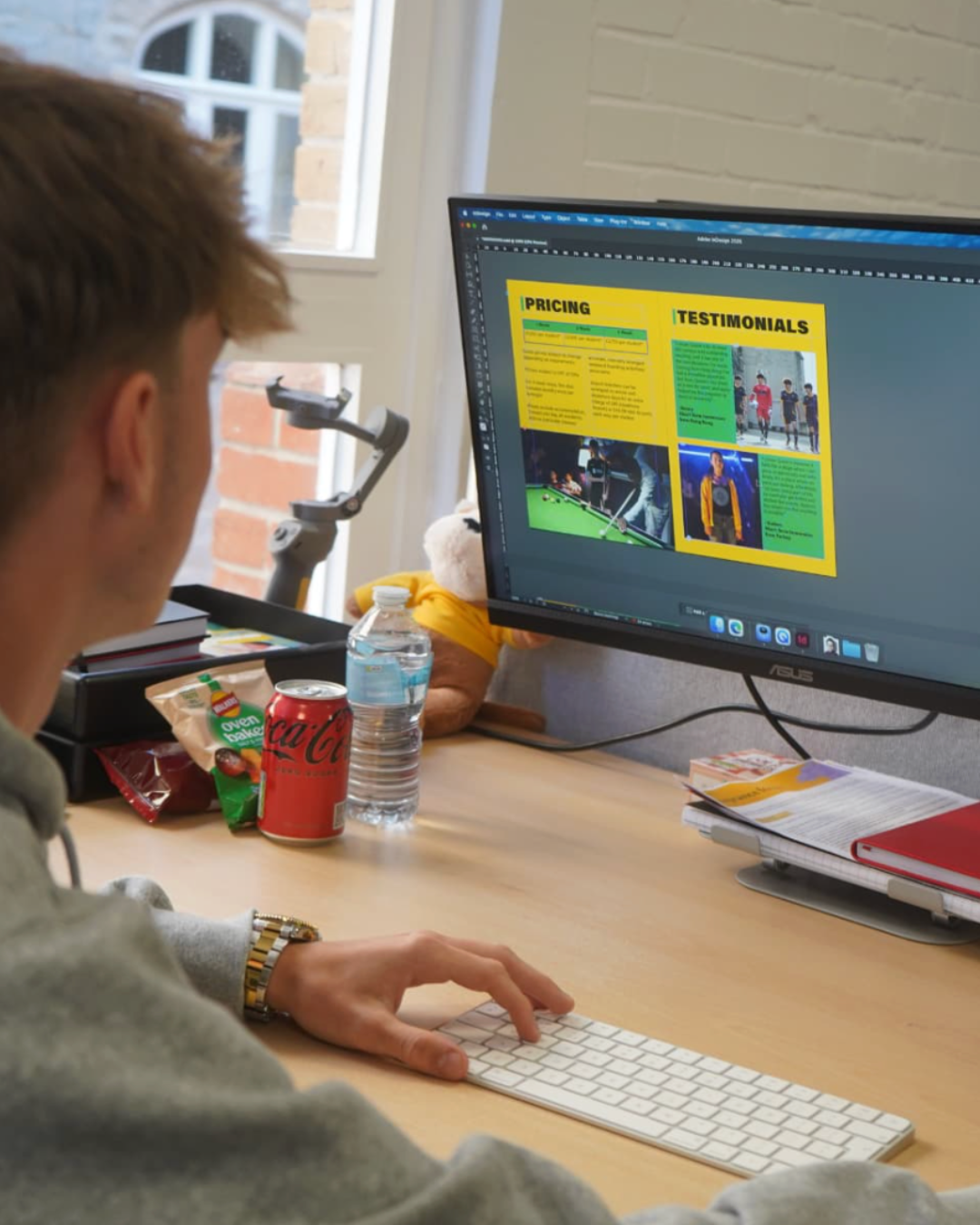 Jack Frampton designing a Queen's College Taunton marketing layout in Adobe InDesign Jack Frampton designing a Queen's College Taunton marketing layout in Adobe InDesign